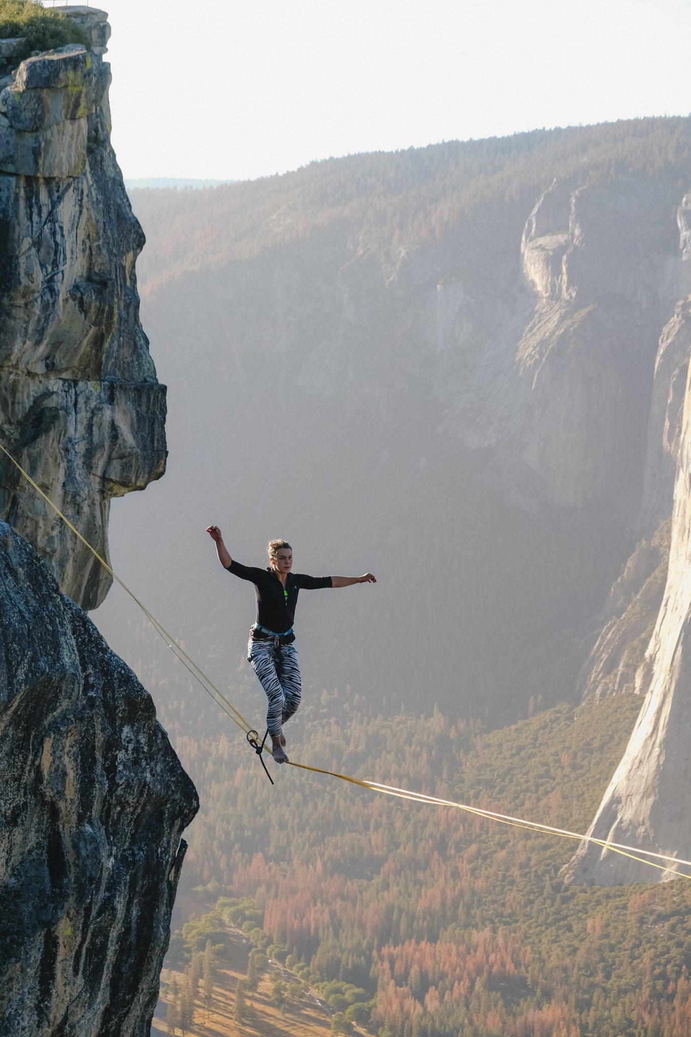 Woman balancing on wire